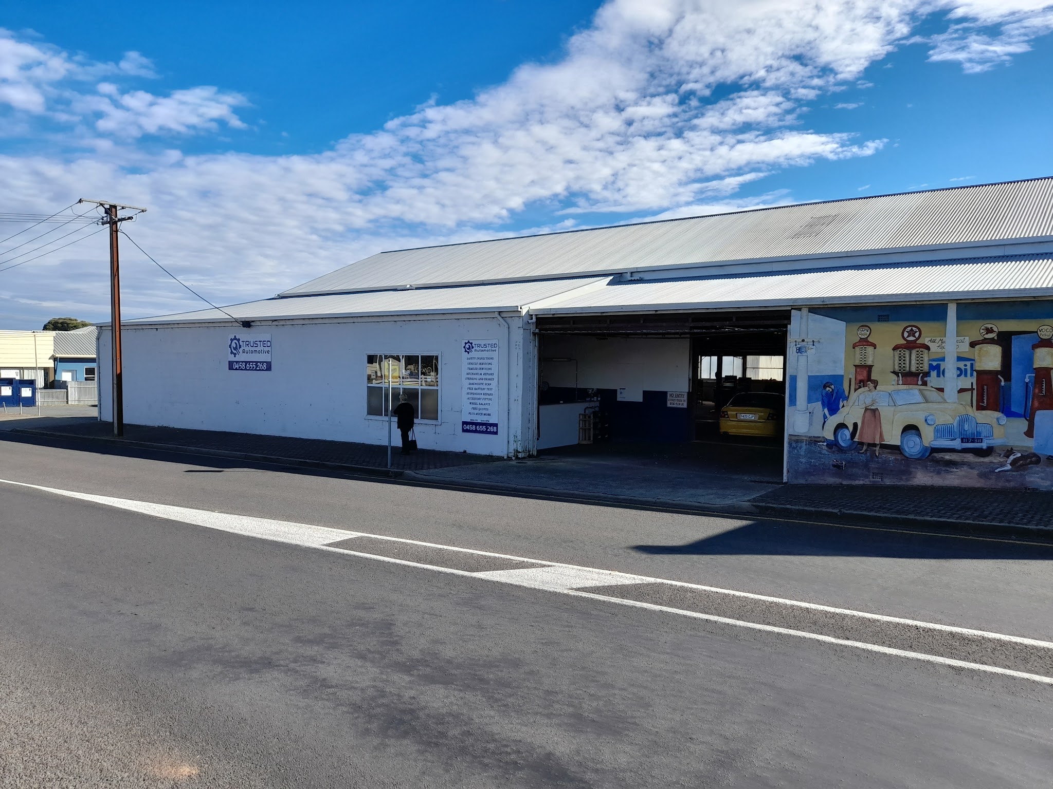The Trusted Automotive workshop on George Street, Millicent, with the roller door open